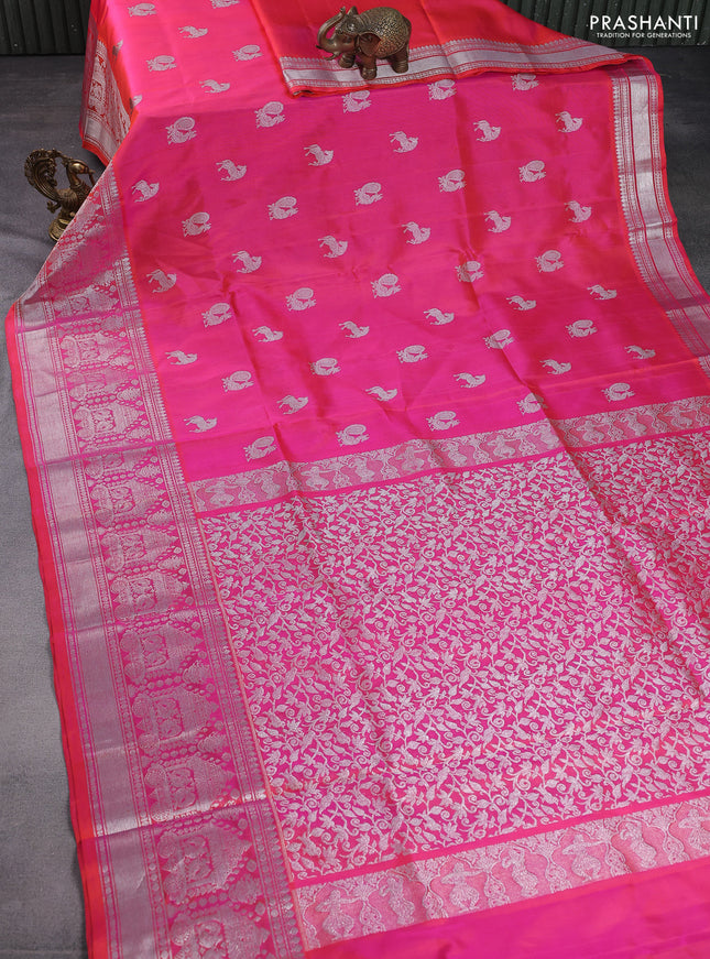 Venkatagiri silk saree dual shade of pinkish orange with silver zari woven buttas and rich silver zari woven border