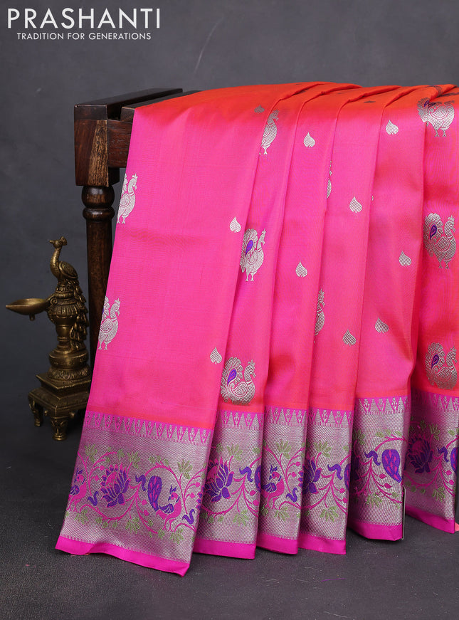 Venkatagiri silk saree dual shade of pinkish orange and pink with silver zari woven buttas and silver zari woven peacock design border