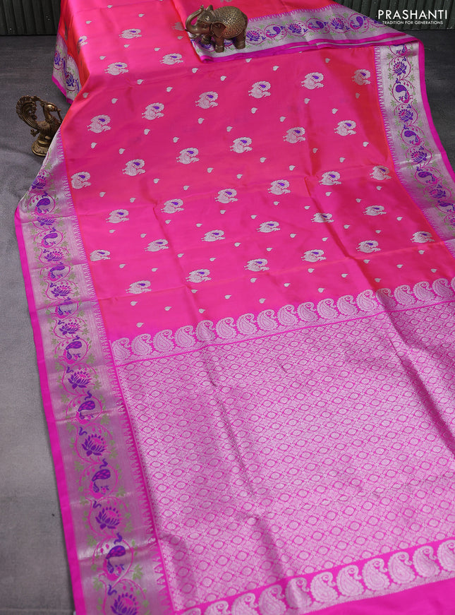 Venkatagiri silk saree dual shade of pinkish orange and pink with silver zari woven buttas and silver zari woven peacock design border