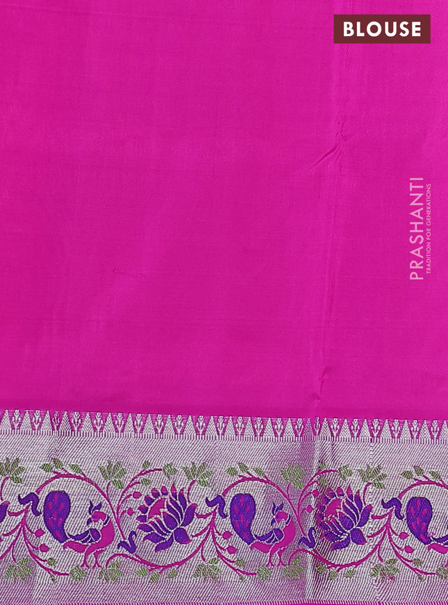 Venkatagiri silk saree dual shade of pinkish orange and pink with silver zari woven buttas and silver zari woven peacock design border