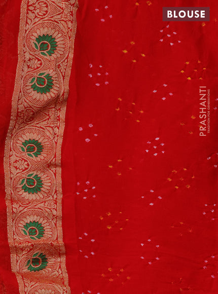Banarasi georgette saree orange and red with bandhani prints & mina weaves and woven border
