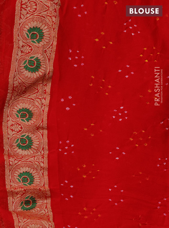 Banarasi georgette saree orange and red with bandhani prints & mina weaves and woven border