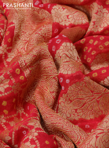 Banarasi georgette saree reddish pink with bandhani prints & zari weaves and woven border