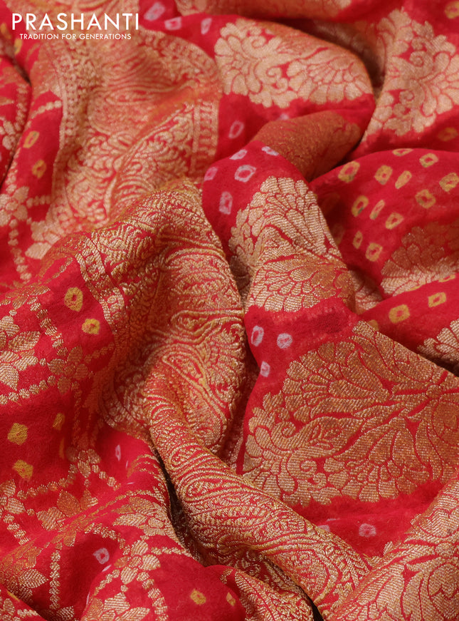 Banarasi georgette saree reddish pink with bandhani prints & zari weaves and woven border
