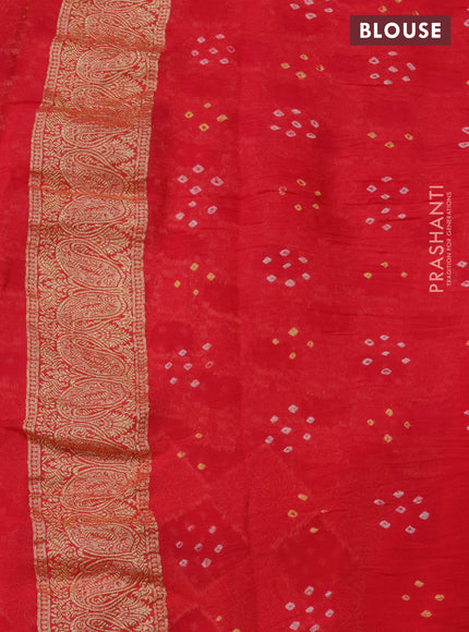 Banarasi georgette saree reddish pink with bandhani prints & zari weaves and woven border