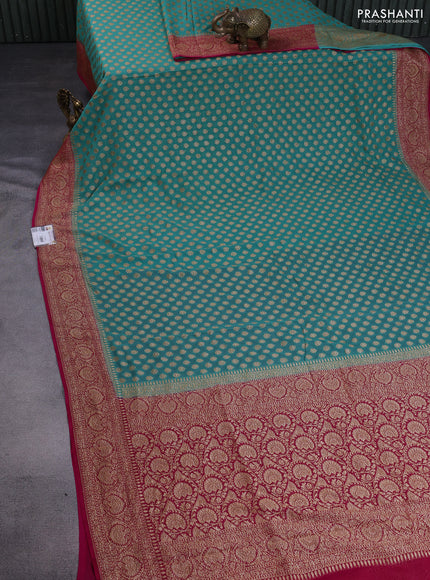 Banarasi georgette saree teal green shade and pink with allover thread & zari woven buttas and woven border
