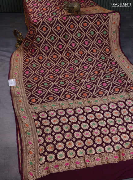 Banarasi georgette saree wine shade with bandhani prints & mina weaves and woven border
