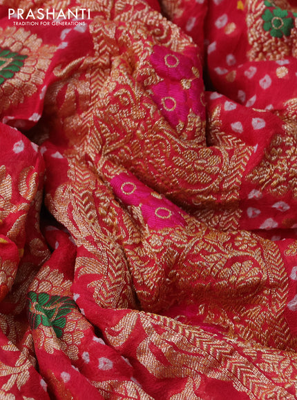 Banarasi georgette saree peach pink with bandhani prints & mina weaves and woven border