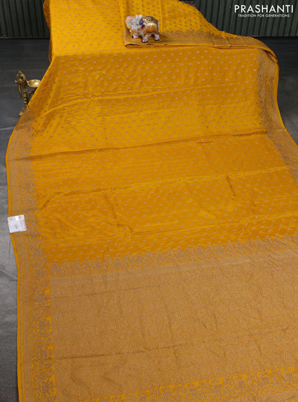 Banarasi crepe saree mustard yellow with allover thread & zari woven buttas and woven border