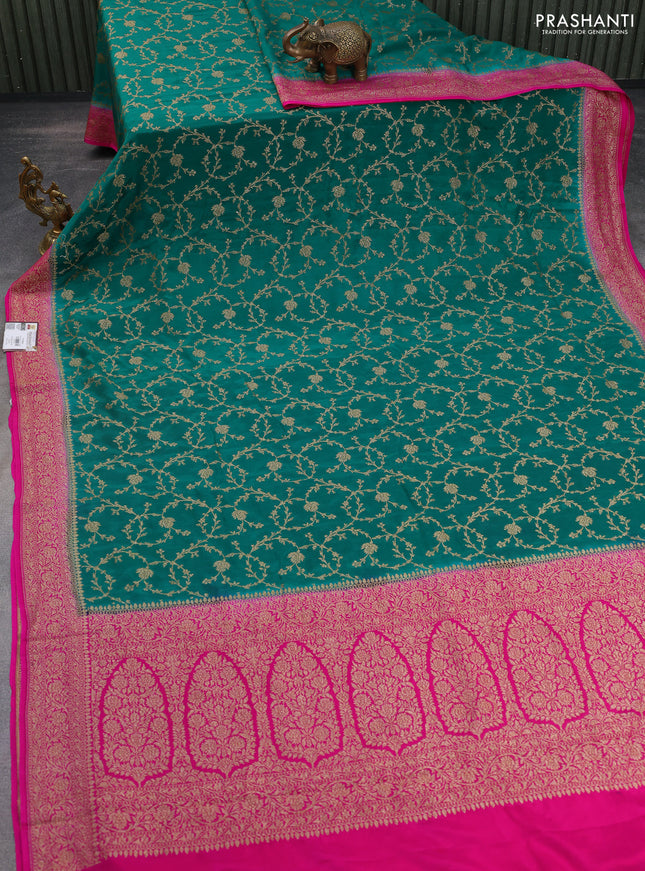 Banarasi crepe saree teal green and pink with allover thread & zari weaves and woven border