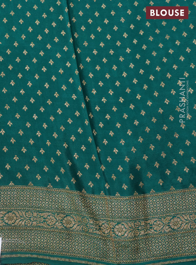 Banarasi crepe saree green and cs blue with allover geometric zari weaves and woven border