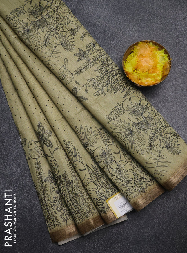 Semi tussar saree pastel green with allover butta prints and long printed border