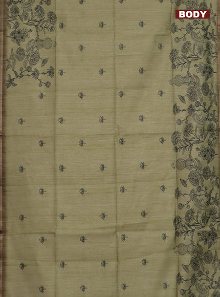 Semi tussar saree pastel green with allover butta prints and long printed border