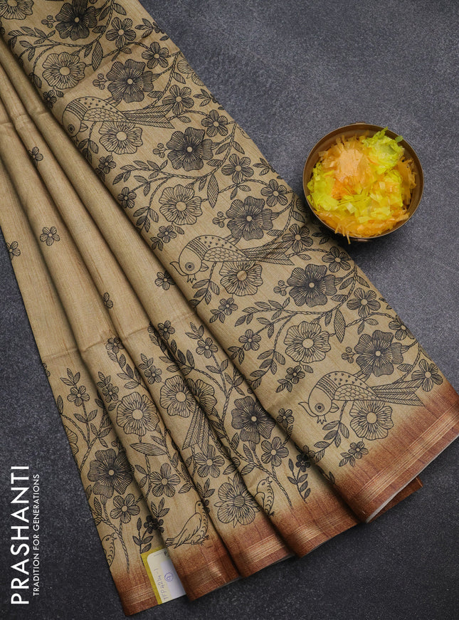 Semi tussar saree sandal with allover floral butta prints and long printed border