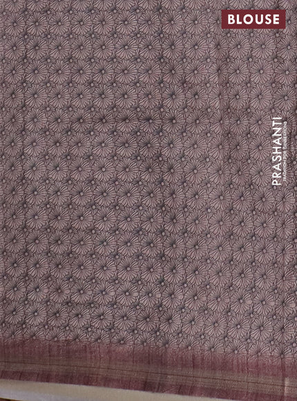 Semi tussar saree pastel brown with allover floral butta prints and long printed border