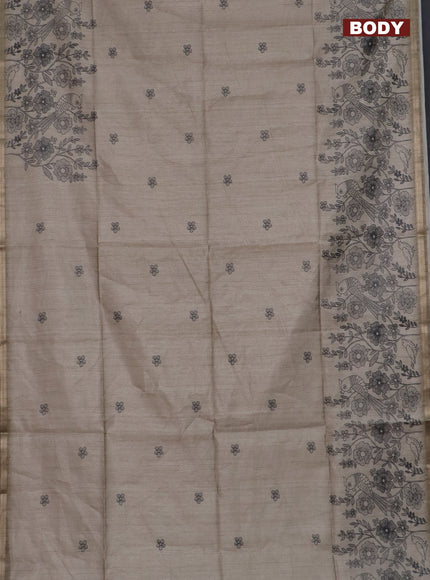 Semi tussar saree beige with allover floral butta prints and long printed border