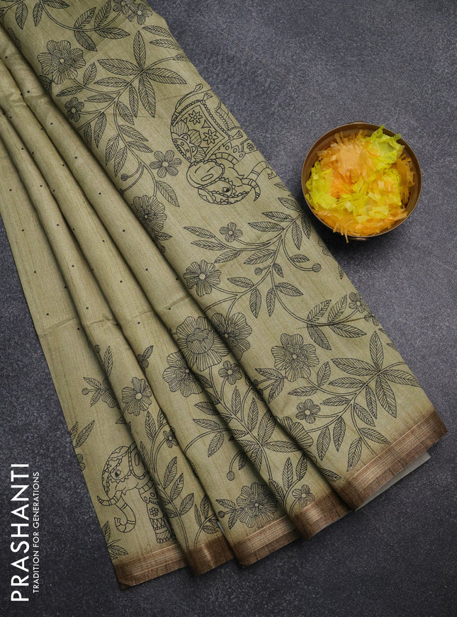 Semi tussar saree pastel green with allover butta prints and long printed border
