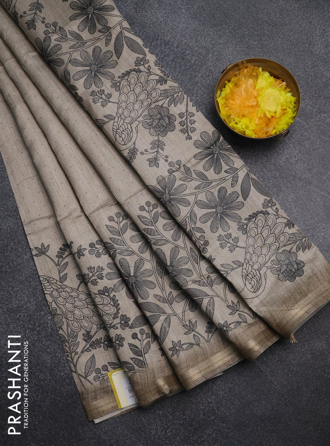 Semi tussar saree beige with allover butta prints and long printed border