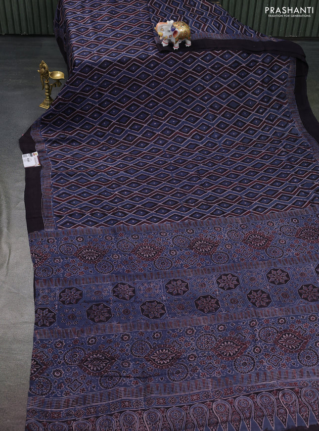 Printed silk saree blue and black with allover ajrakh prints and simple border