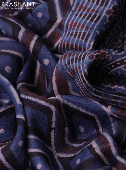 Printed silk saree blue and black with allover ajrakh prints and simple border