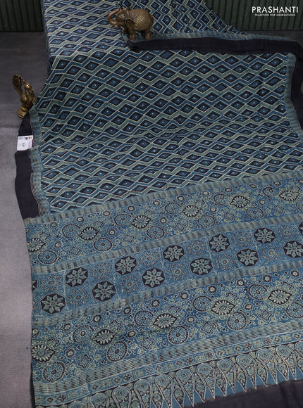 Printed silk saree blue and black with allover ajrakh prints and simple border