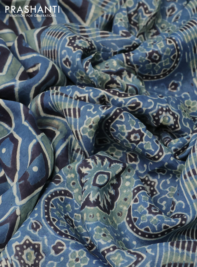 Printed silk saree blue and black with allover ajrakh prints and simple border