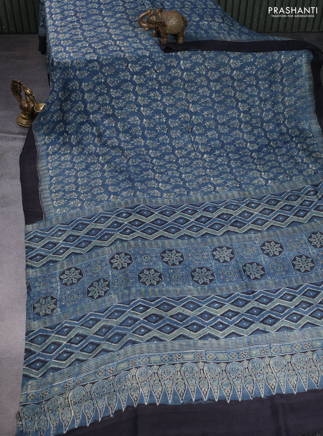 Printed silk saree blue and black with allover ajrakh prints and simple border