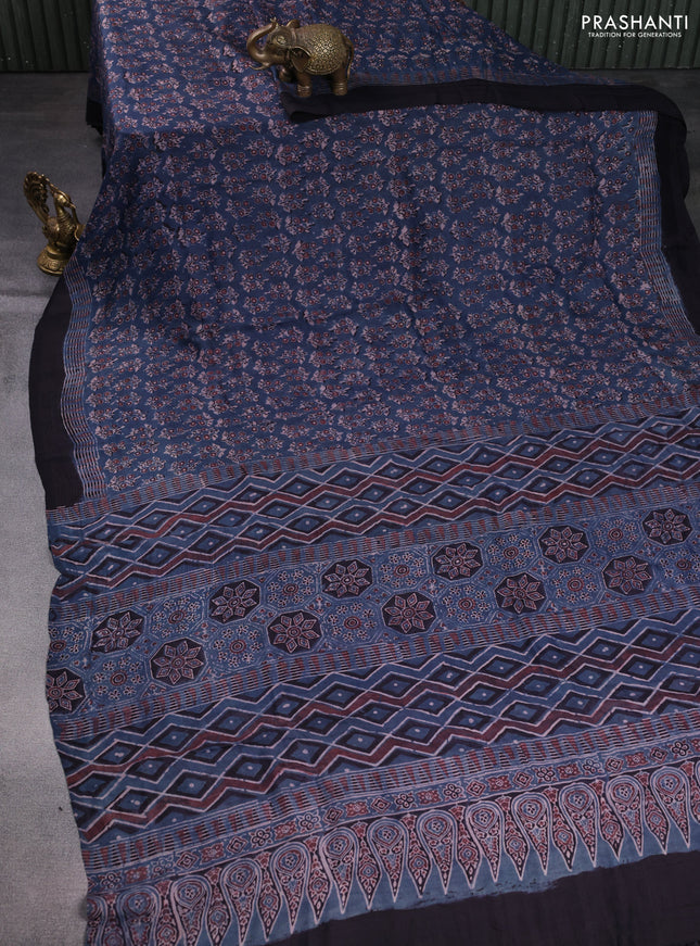 Printed silk saree blue and black with allover ajrakh prints and simple border