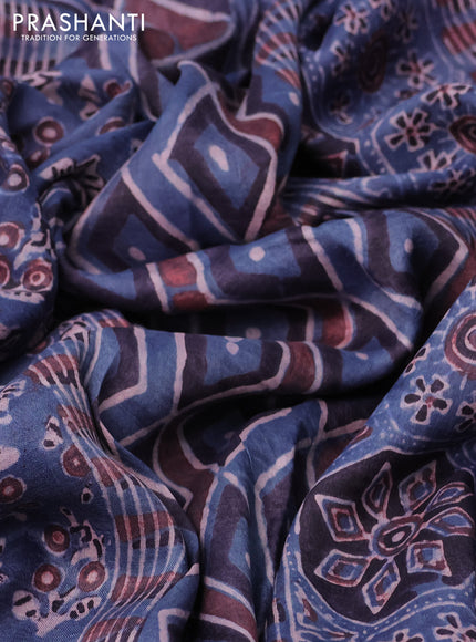 Printed silk saree blue and black with allover ajrakh prints and simple border