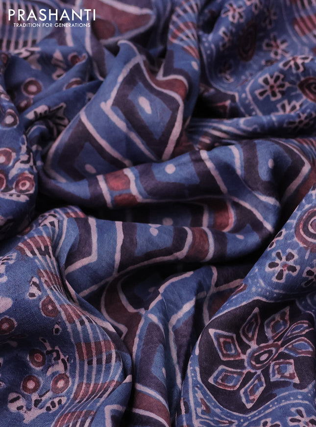 Printed silk saree blue and black with allover ajrakh prints and simple border