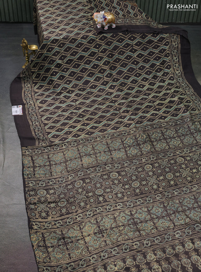 Printed silk saree grey shade and blue with allover ajrakh prints and simple border