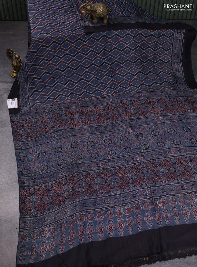 Printed silk saree blue and black with allover ajrakh prints and simple border