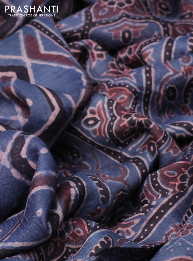 Printed silk saree blue and black with allover ajrakh prints and simple border