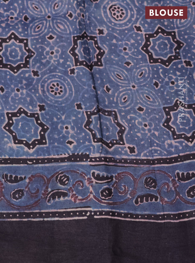 Printed silk saree blue and black with allover ajrakh prints and simple border