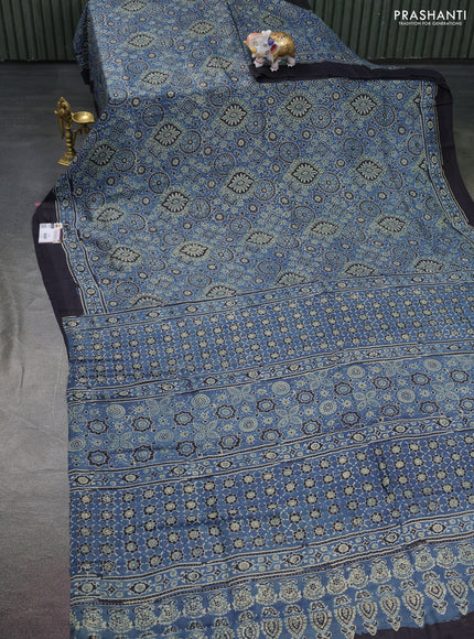 Printed silk saree blue and black with allover ajrakh prints and simple border