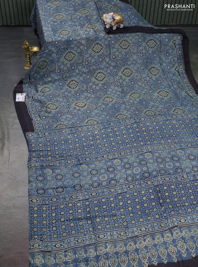 Printed silk saree blue and black with allover ajrakh prints and simple border