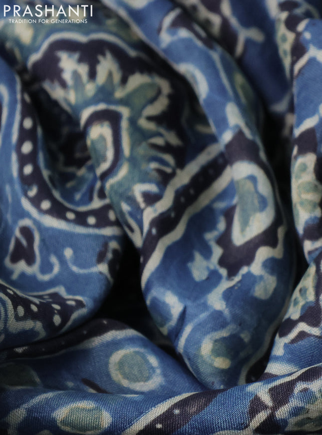 Printed silk saree blue and black with allover ajrakh prints and simple border