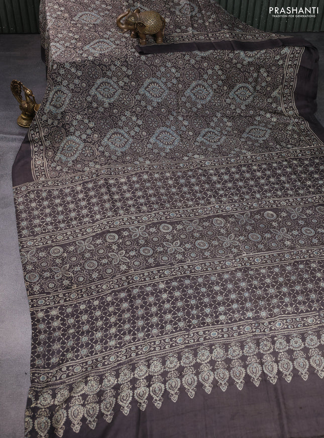 Printed silk saree grey shade with allover ajrakh prints and simple border