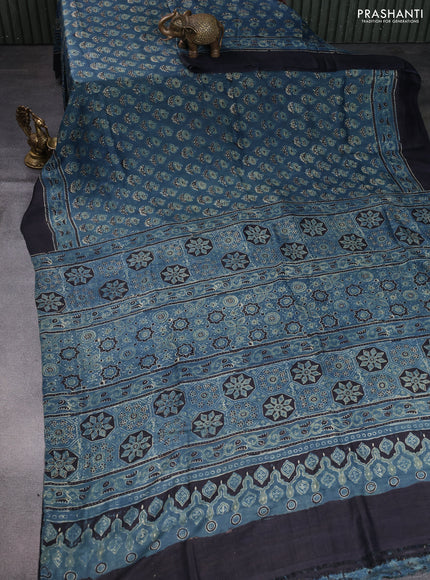 Printed silk saree blue and black with allover ajrakh prints and simple border