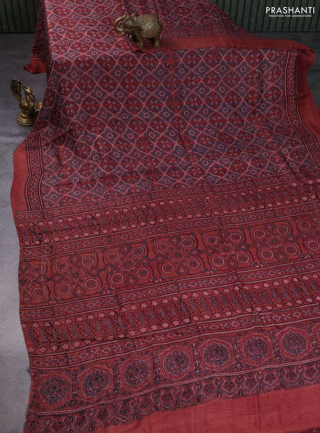 Printed silk saree maroon shade with allover ajrakh prints and simple border