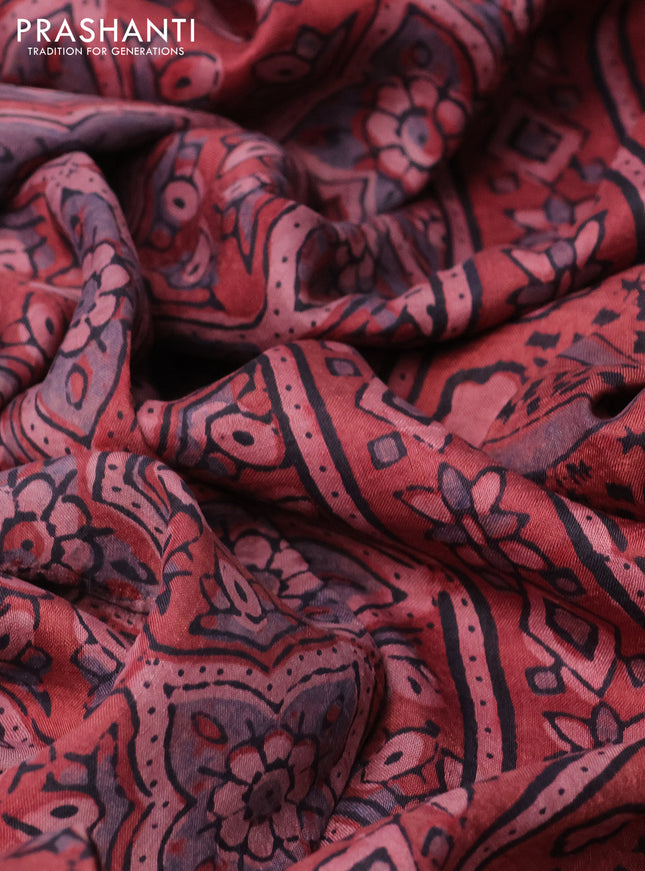 Printed silk saree maroon shade with allover ajrakh prints and simple border