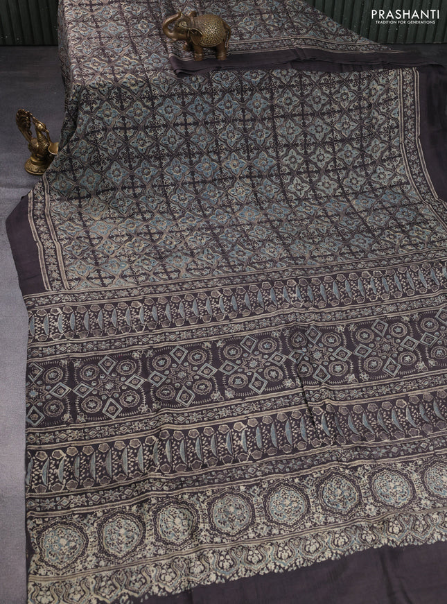 Printed silk saree grey shade with allover ajrakh prints and simple border