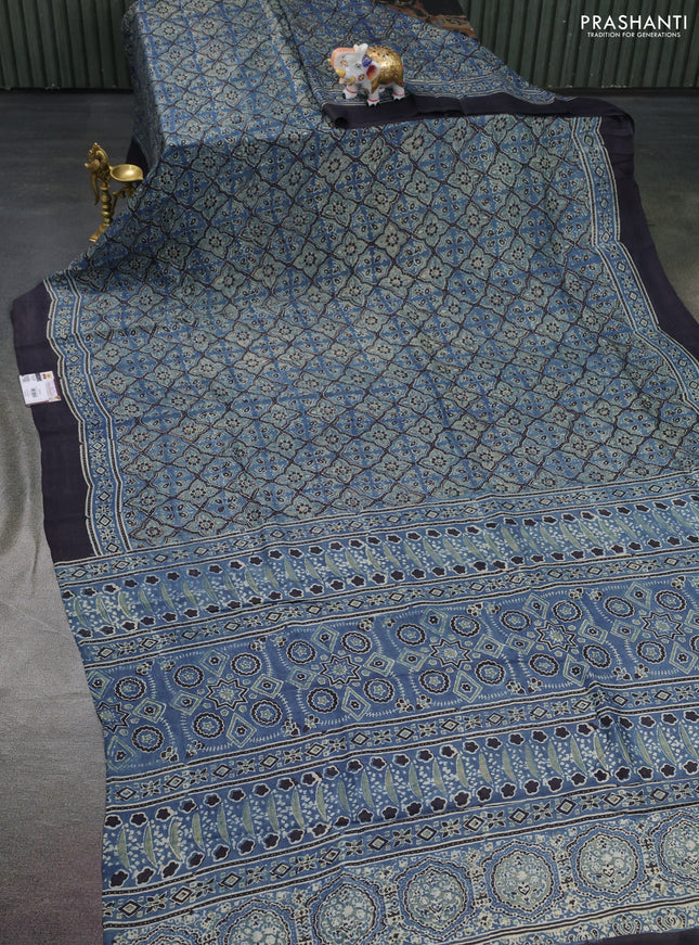 Printed silk saree bluish grey and black with allover ajrakh prints and simple border