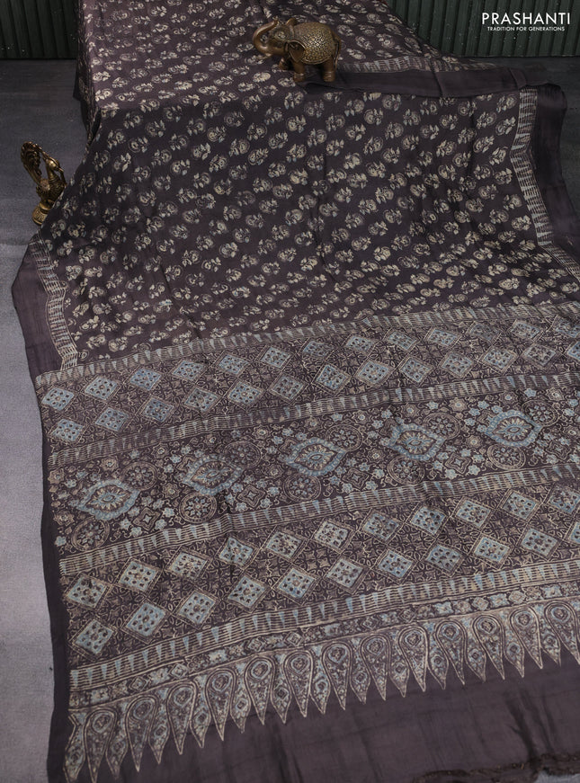Printed silk saree grey shade with allover ajrakh prints and simple border