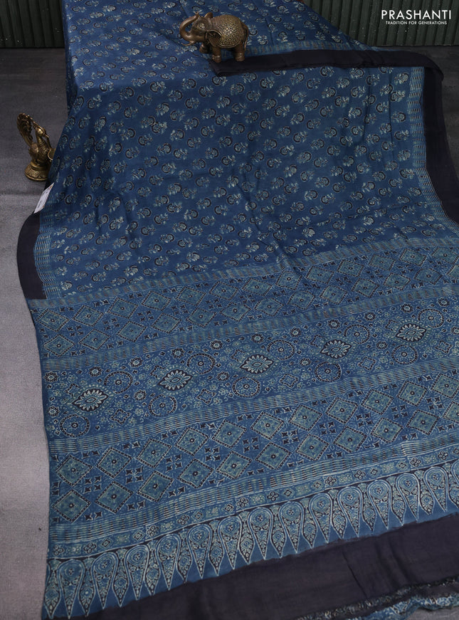 Printed silk saree blue and black with allover ajrakh prints and simple border