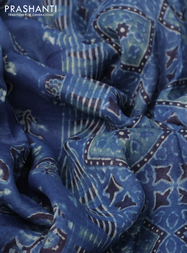 Printed silk saree blue and black with allover ajrakh prints and simple border