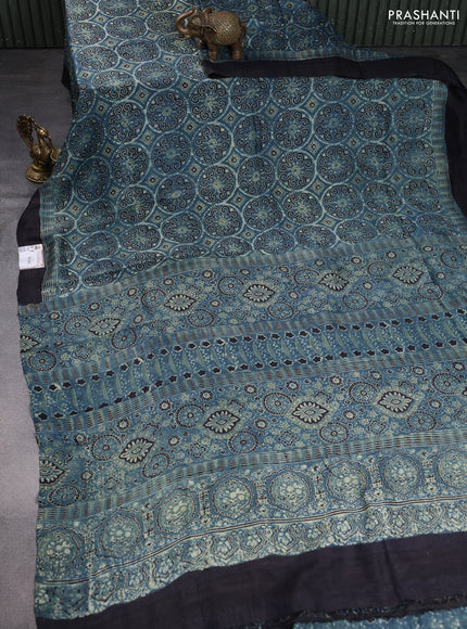 Printed silk saree blue and black with allover ajrakh prints and simple border