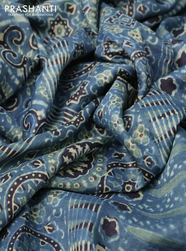 Printed silk saree blue and black with allover ajrakh prints and simple border