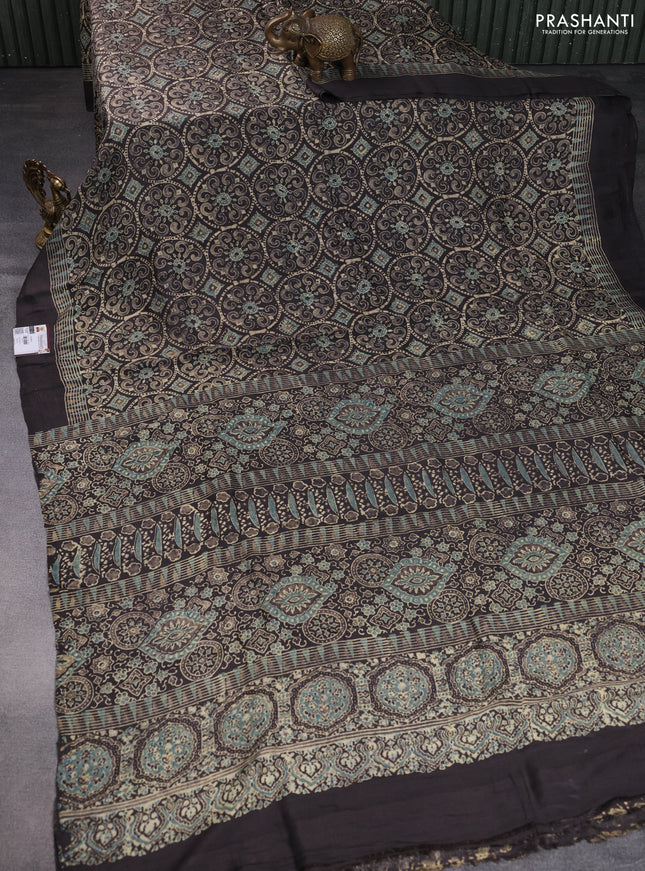 Printed silk saree grey shade with allover ajrakh prints and simple border