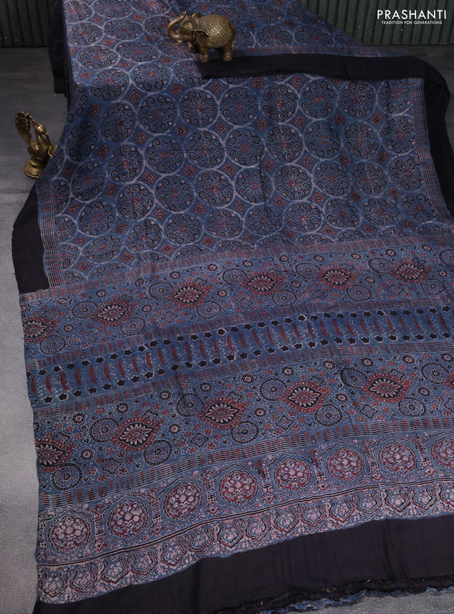 Printed silk saree blue and black with allover ajrakh prints and simple border
